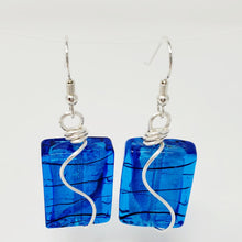 Load image into Gallery viewer, Blue Glass with Black Swirl Earrings wrapped in Fine Sliver with Argentium Silver Ear Wire
